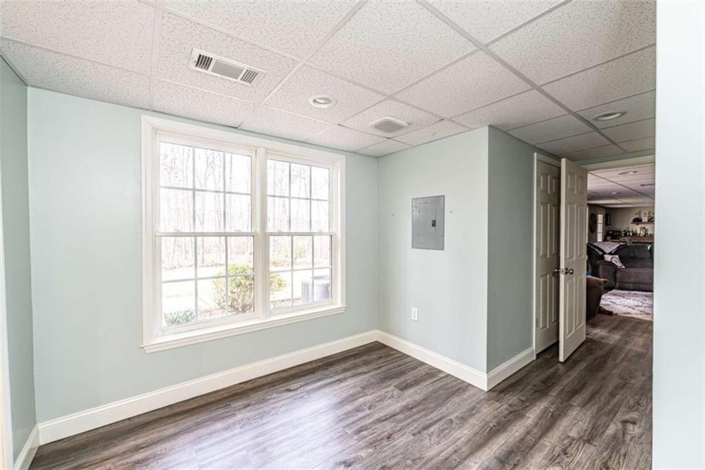 15 Quarter Horse Drive Northwest Rome, GA 30165 - Photo 49 of 57 an empty room with wooden floor and windows