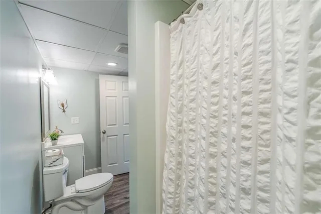 a front view of a house with a ocean view