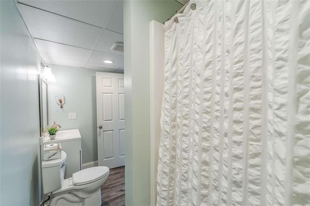 15 Quarter Horse Drive Northwest Rome, GA 30165 - Photo 50 of 57 a bathroom with a granite countertop toilet and a sink