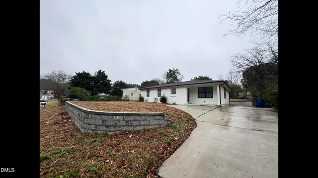 a view of a house with a park