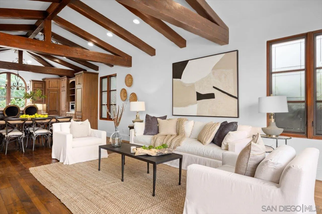 1646 Kearsarge Road La Jolla, CA 92037 - Photo 18 of 35 a living room with furniture and wooden floor