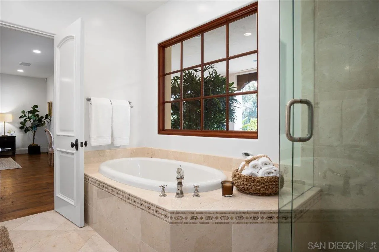 1646 Kearsarge Road La Jolla, CA 92037 - Photo 29 of 35 a bath tub sitting next to a window