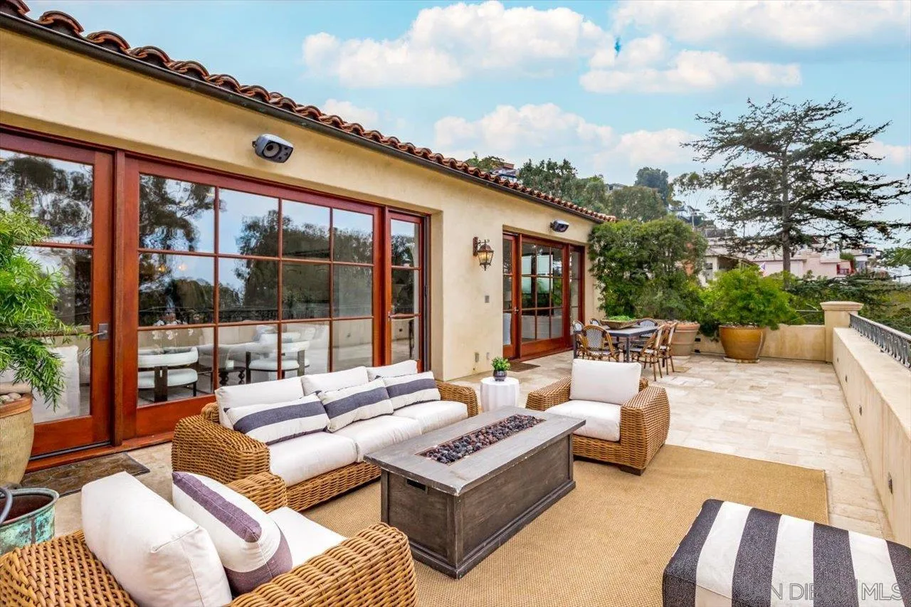 1646 Kearsarge Road La Jolla, CA 92037 - Photo 6 of 35 a outdoor living space with patio furniture and a potted plant