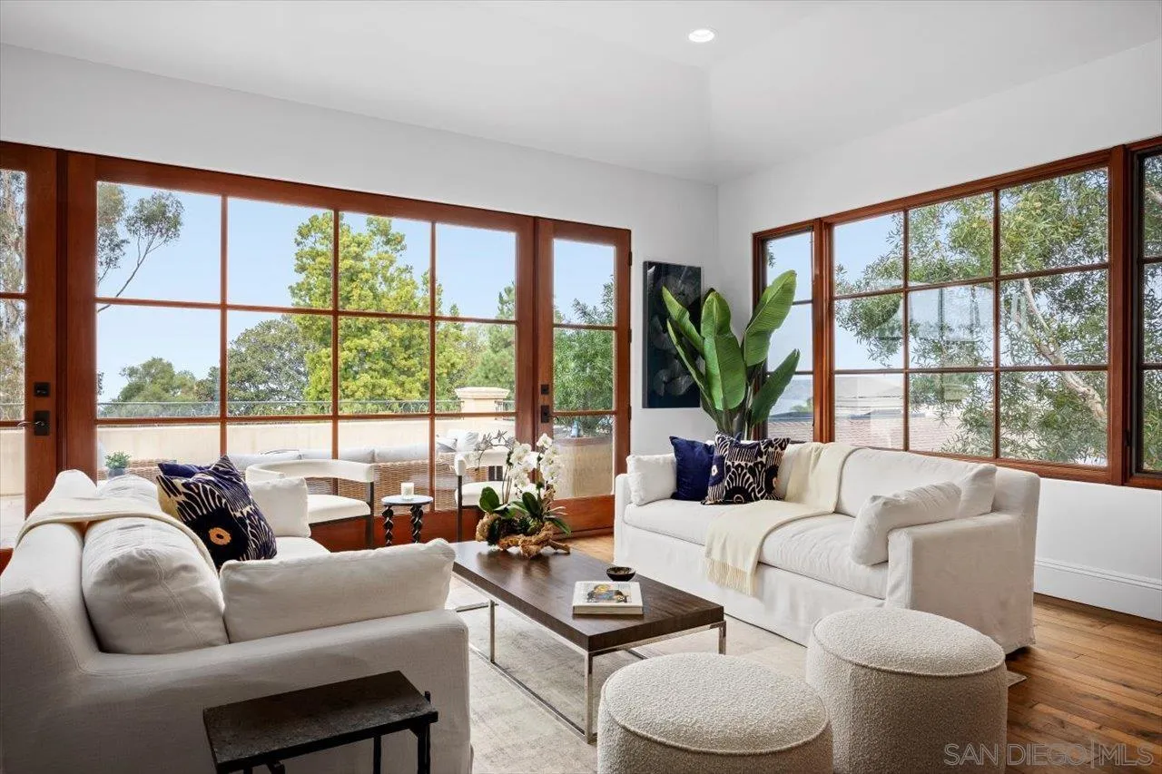 1646 Kearsarge Road La Jolla, CA 92037 - Photo 8 of 35 a living room with furniture and a large window