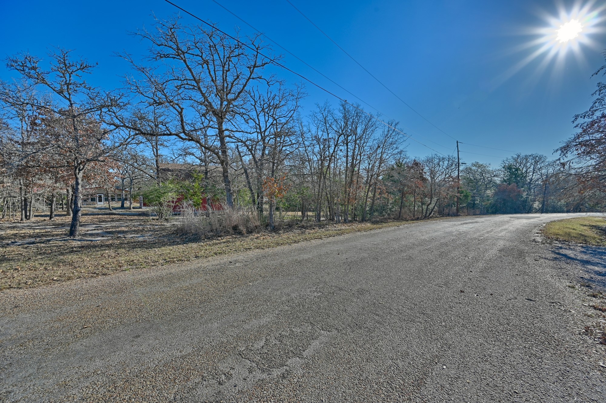100 Choctaw Crest Somerville, TX 77879 - Photo 24 of 26 a view of dirt field with trees in background