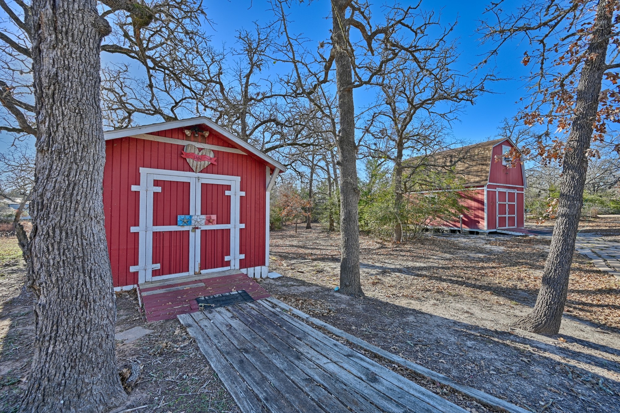 100 Choctaw Crest Somerville, TX 77879 - Photo 4 of 26 a front view of a house with street