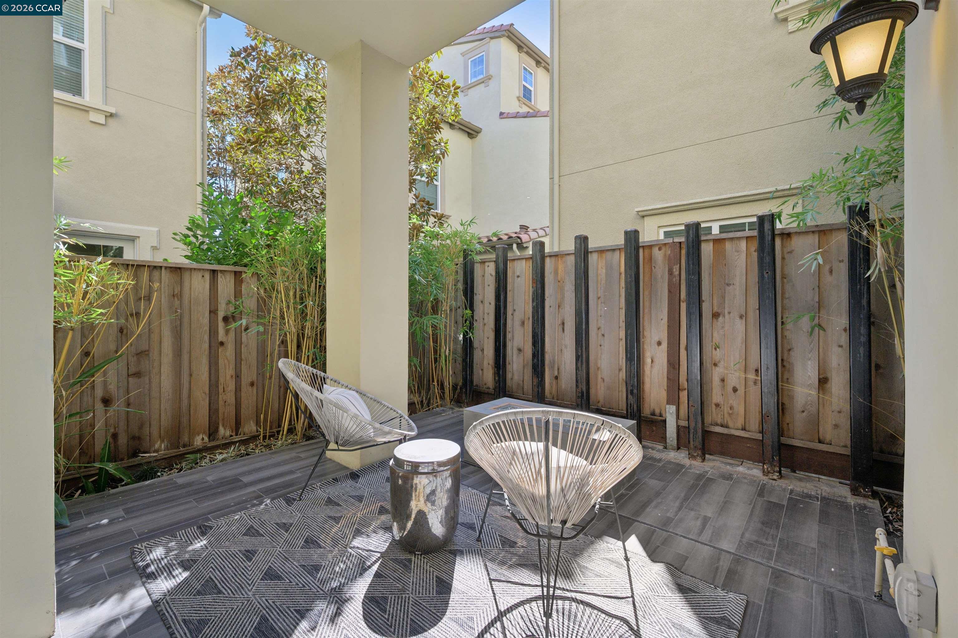 5162 Rowan Drive San Ramon, CA 94582 - Photo 17 of 57 a view of a chairs and table in backyard