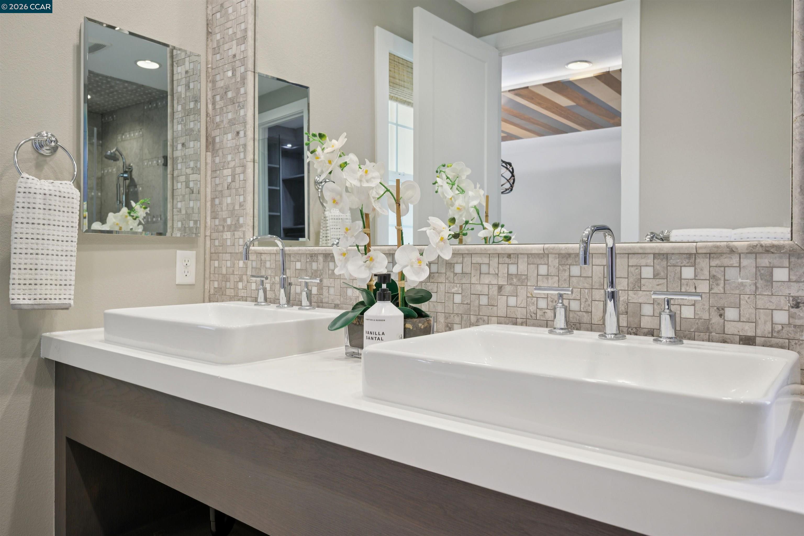 5162 Rowan Drive San Ramon, CA 94582 - Photo 28 of 57 a bathroom with double vanity sinks and a mirror