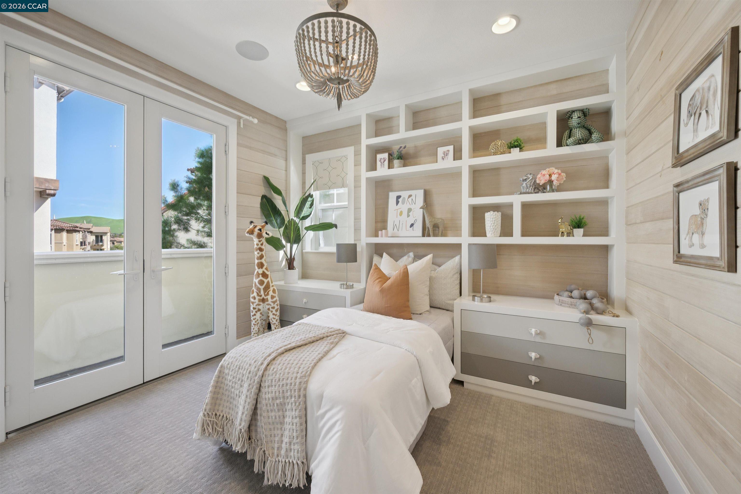 5162 Rowan Drive San Ramon, CA 94582 - Photo 33 of 57 a bedroom with a large bed and a chandelier