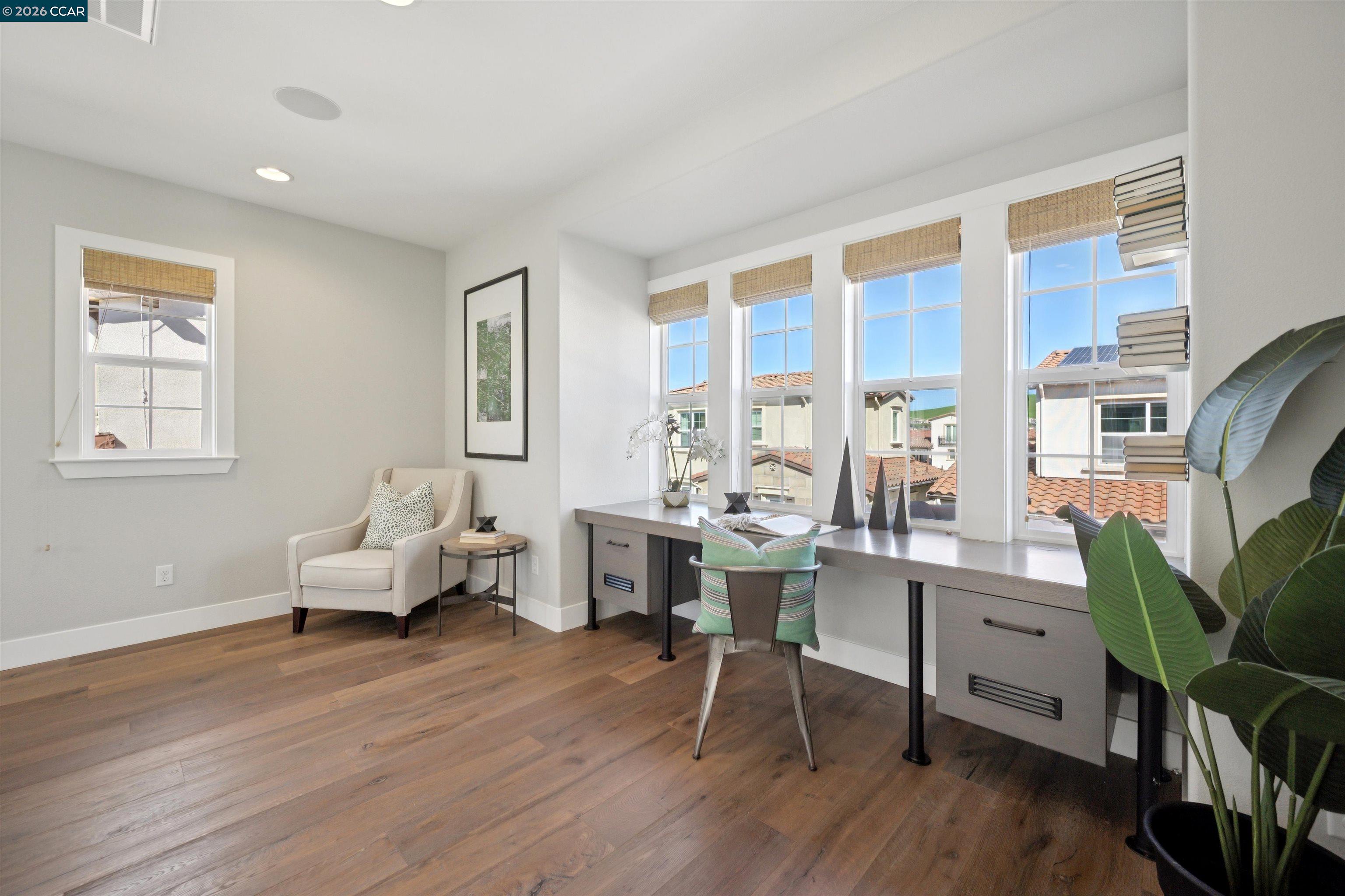 5162 Rowan Drive San Ramon, CA 94582 - Photo 44 of 57 a living room with furniture a wooden floor and a large window