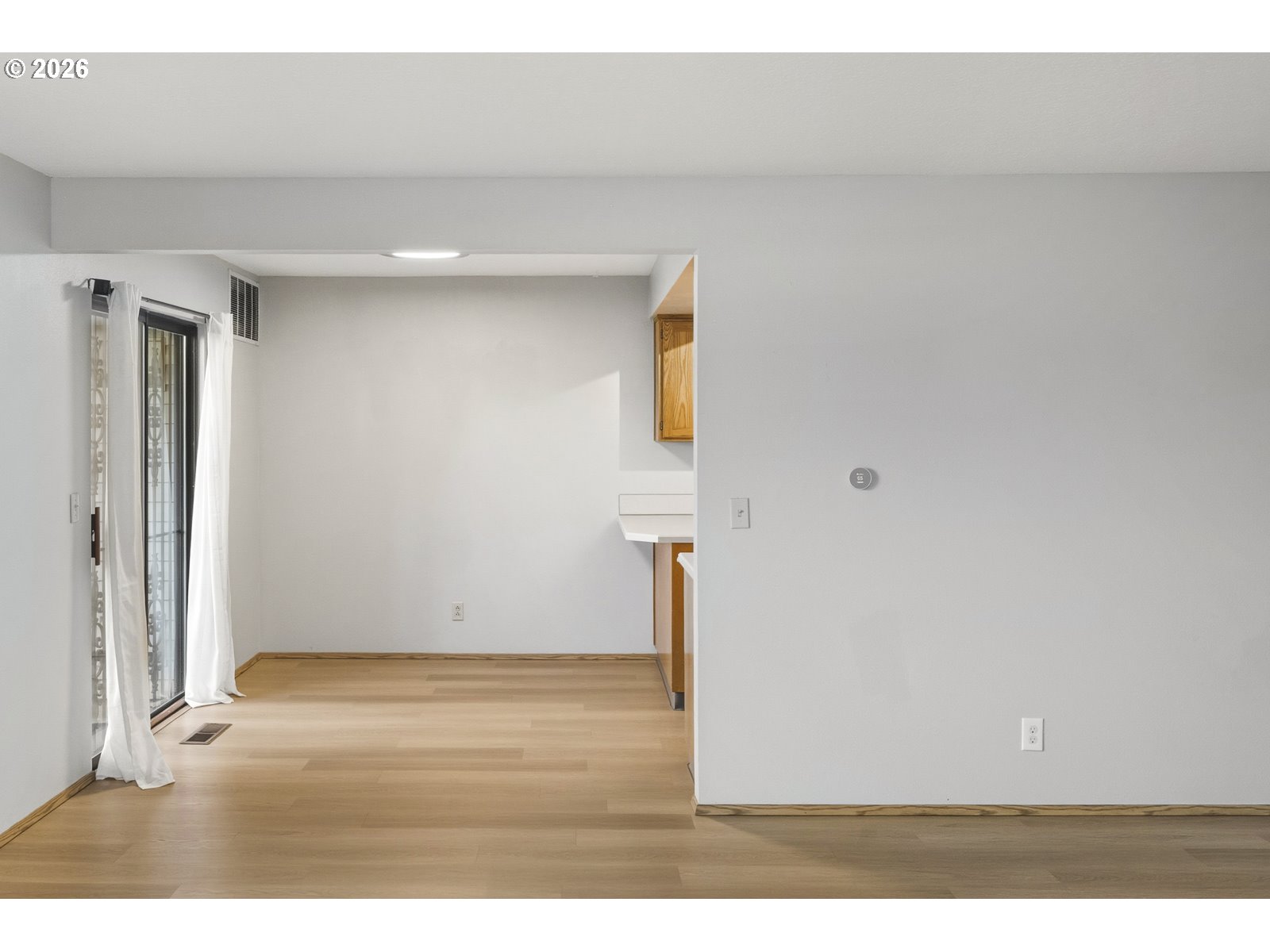 12516 Southeast Stark Street, Unit C Portland, OR 97233 - Photo 16 of 47 a view of an empty room