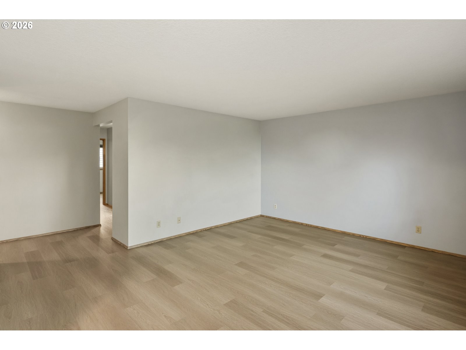 12516 Southeast Stark Street, Unit C Portland, OR 97233 - Photo 20 of 47 a view of an empty room