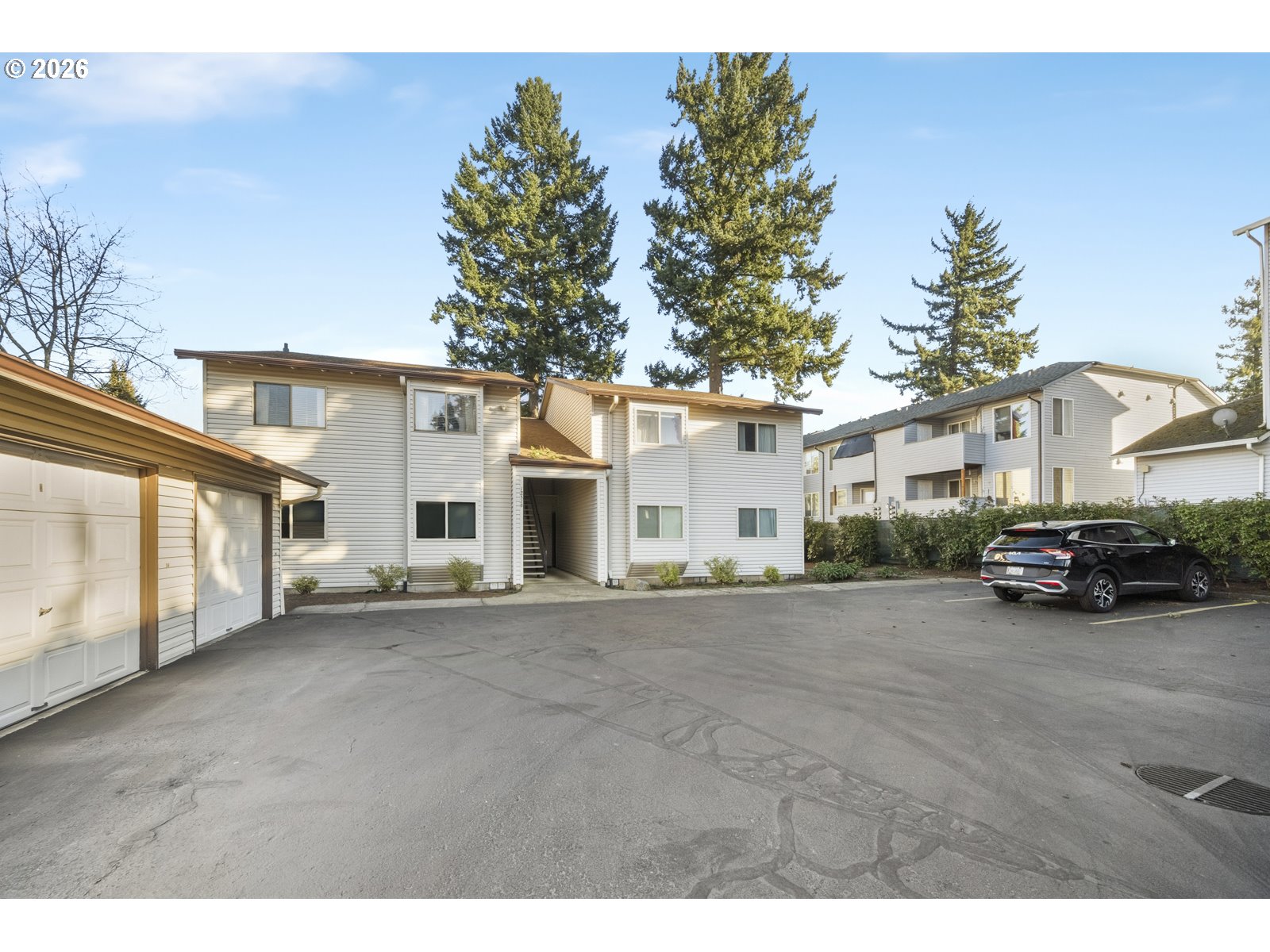 12516 Southeast Stark Street, Unit C Portland, OR 97233 - Photo 2 of 47 a view of a house with a outdoor space