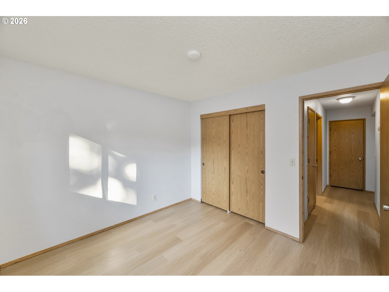 12516 Southeast Stark Street, Unit C Portland, OR 97233 - Photo 26 of 47 a view interior of a house with wooden floor