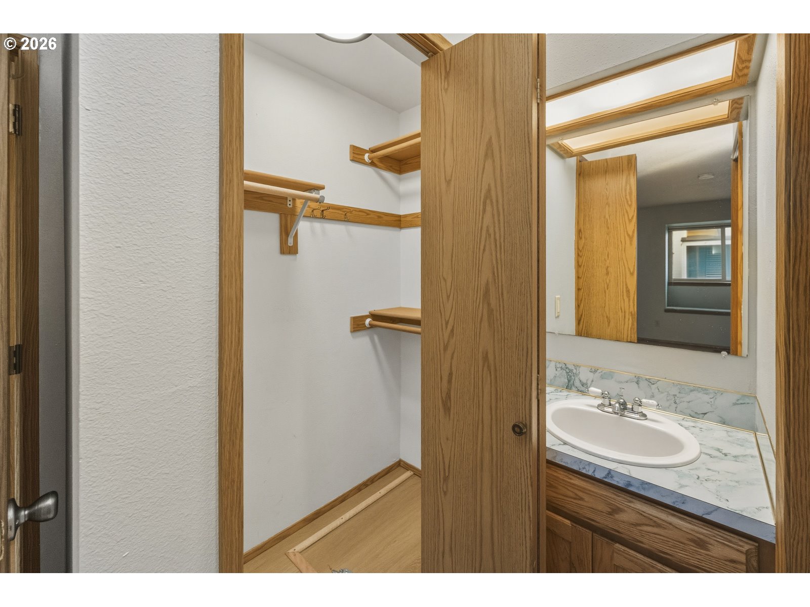 12516 Southeast Stark Street, Unit C Portland, OR 97233 - Photo 35 of 47 a bathroom with a sink and mirror