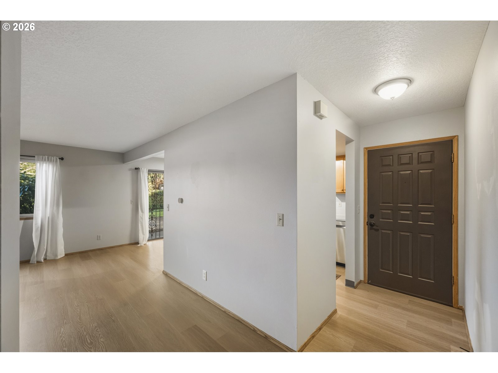 12516 Southeast Stark Street, Unit C Portland, OR 97233 - Photo 36 of 47 a view of an empty room and window