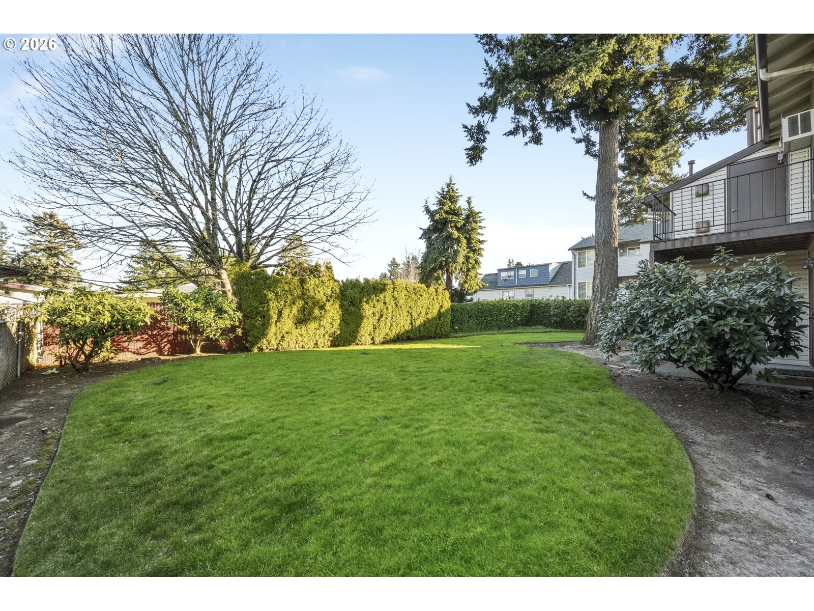12516 Southeast Stark Street, Unit C Portland, OR 97233 - Photo 40 of 47 a view of a grassy field