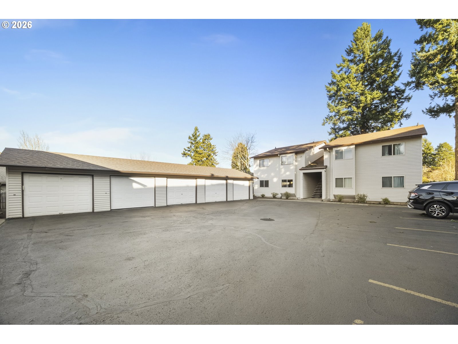 12516 Southeast Stark Street, Unit C Portland, OR 97233 - Photo 47 of 47 a view of a house with a outdoor space