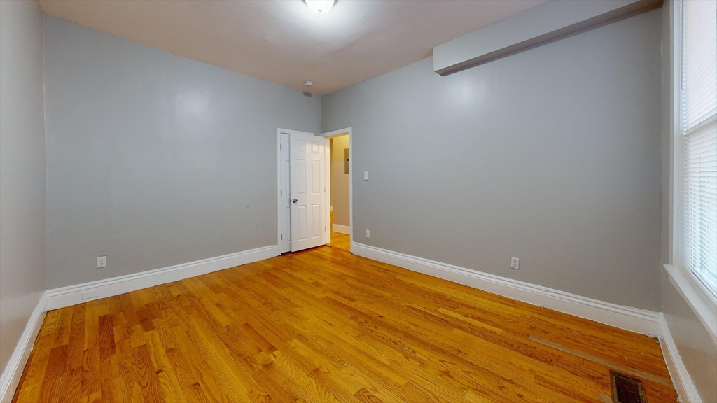 8 Wardman Road, Unit 1 Boston, MA 02119 - Photo 9 of 14 a view of empty room