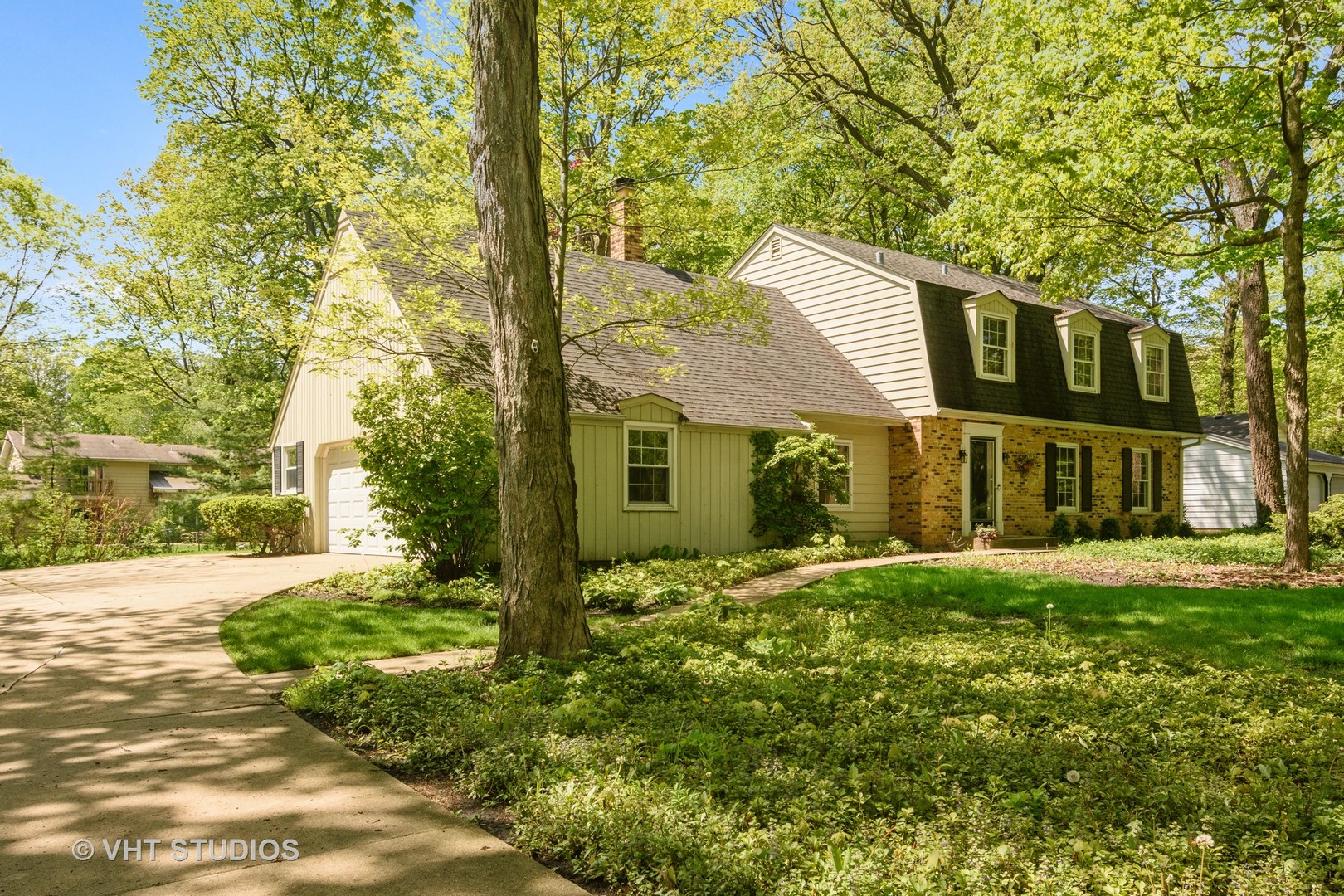 227 Tall Trees Lane Rolling Meadows, IL 60008 - Photo 1 of 15 a front view of a house with a yard