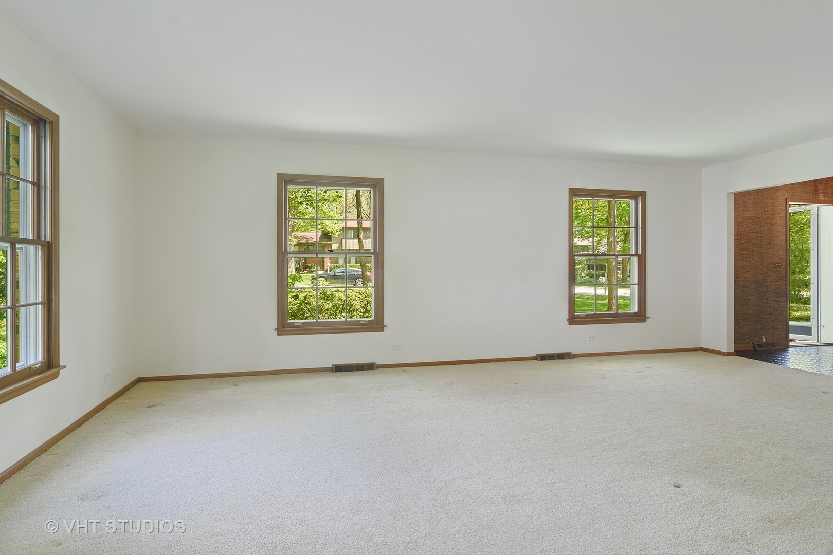 227 Tall Trees Lane Rolling Meadows, IL 60008 - Photo 2 of 15 an empty room with windows