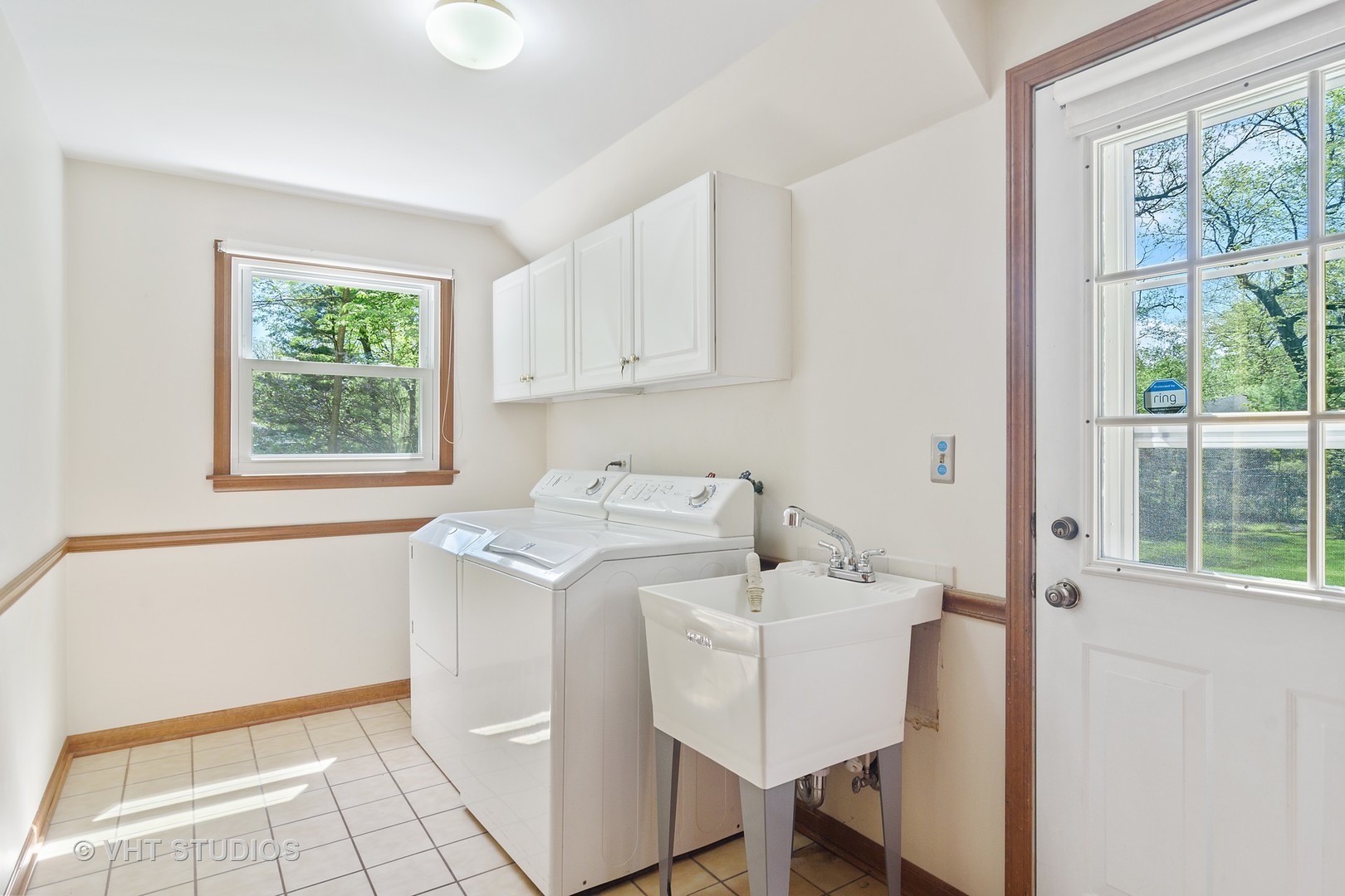 227 Tall Trees Lane Rolling Meadows, IL 60008 - Photo 13 of 15 a utility room with a sink dryer and washer