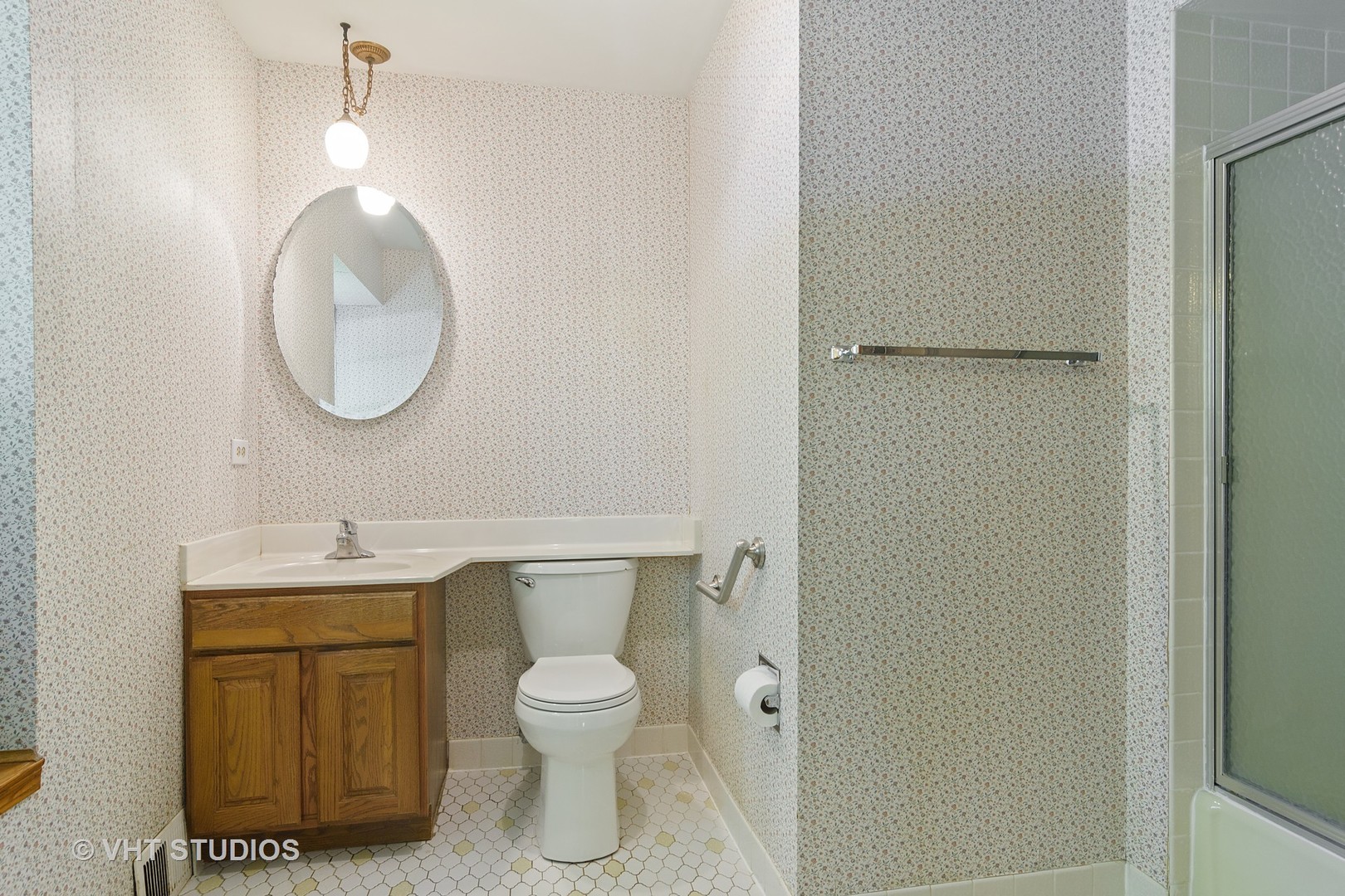 227 Tall Trees Lane Rolling Meadows, IL 60008 - Photo 8 of 15 a bathroom with a toilet sink and mirror