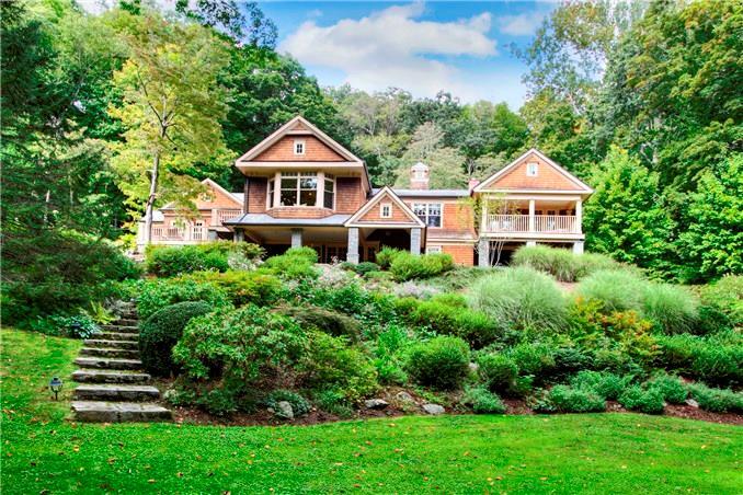 50 Fern Valley Road Weston, CT 06883 - Photo 1 of 1 a front view of a house with a yard
