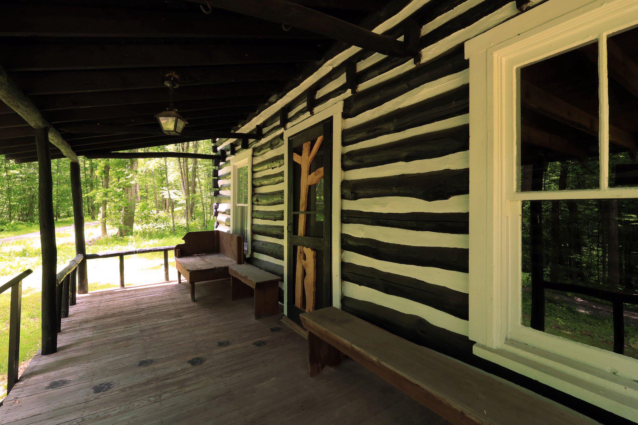 4464 Tram Road Spruce Creek, PA 16683 - Photo 9 of 53 a building outdoor space with wooden floor and outdoor seating