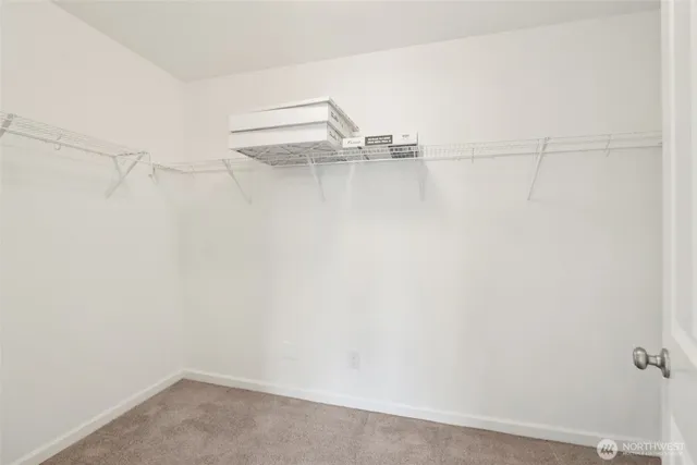 a picture of a room with racks on the wall