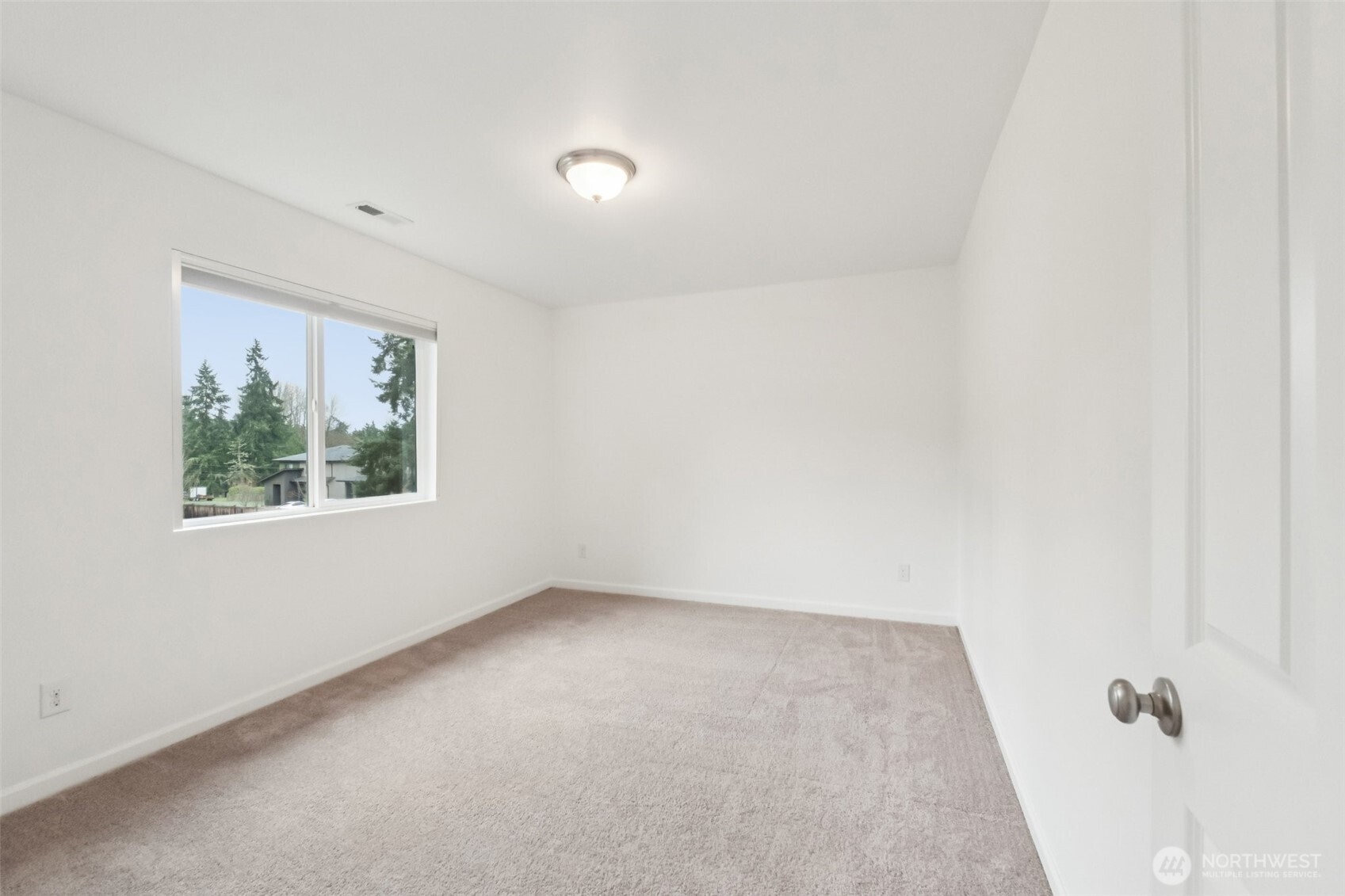 5310 52nd Street West University Place, WA 98467 - Photo 23 of 33 an empty room with a window