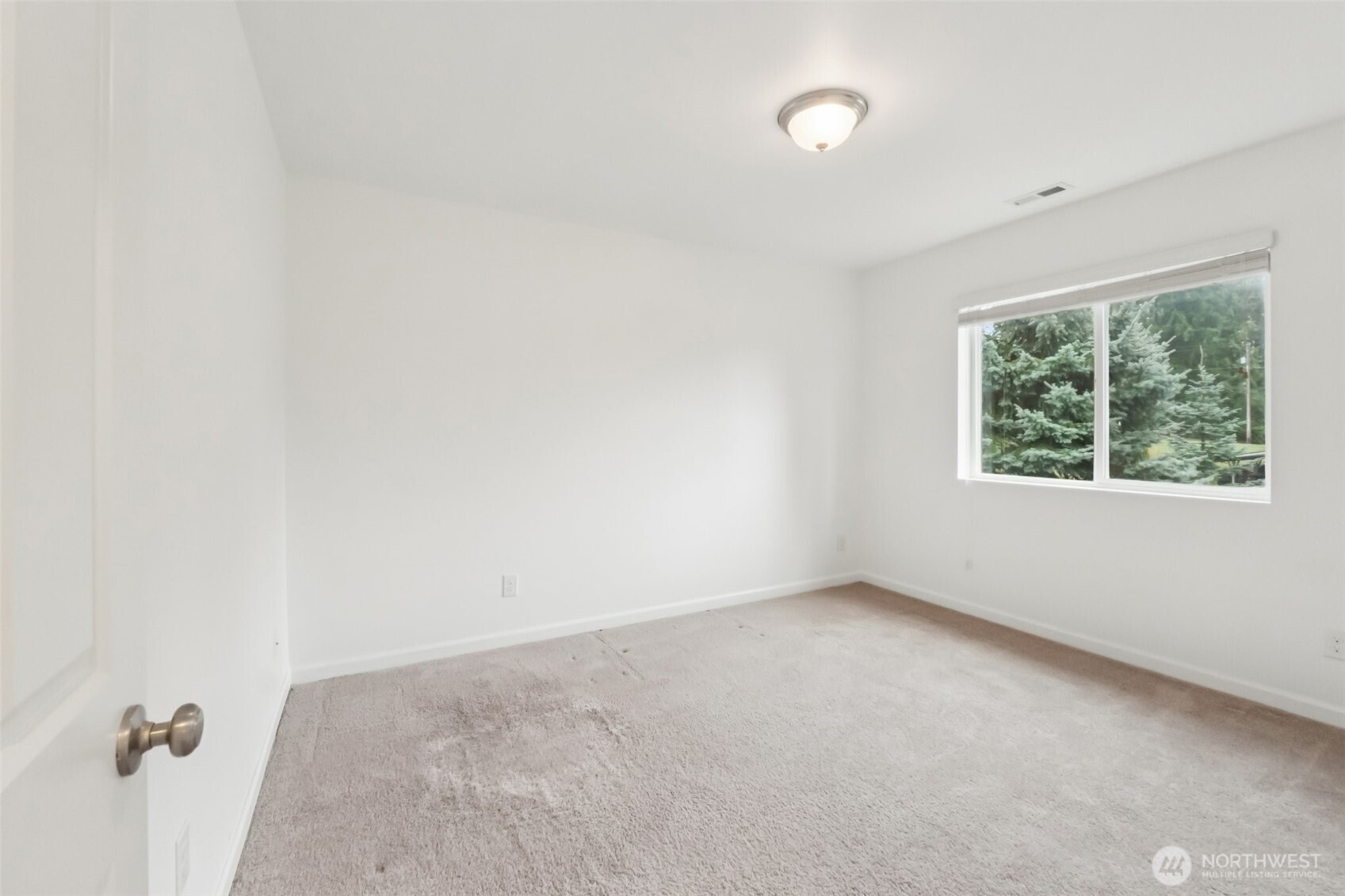 5310 52nd Street West University Place, WA 98467 - Photo 25 of 33 an empty room with a window