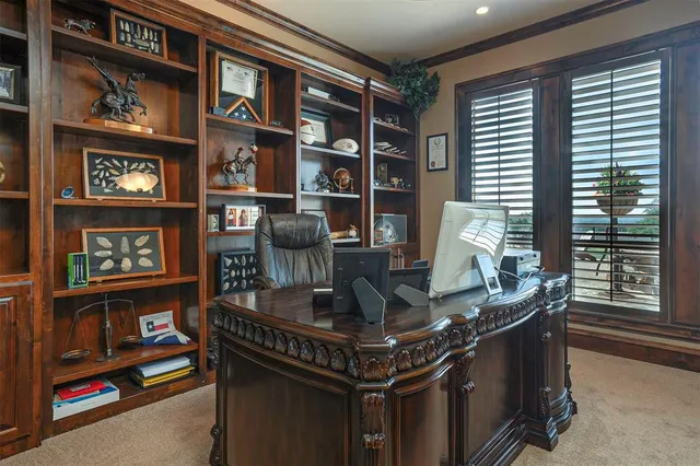 a view of living room with furniture and floor to ceiling window