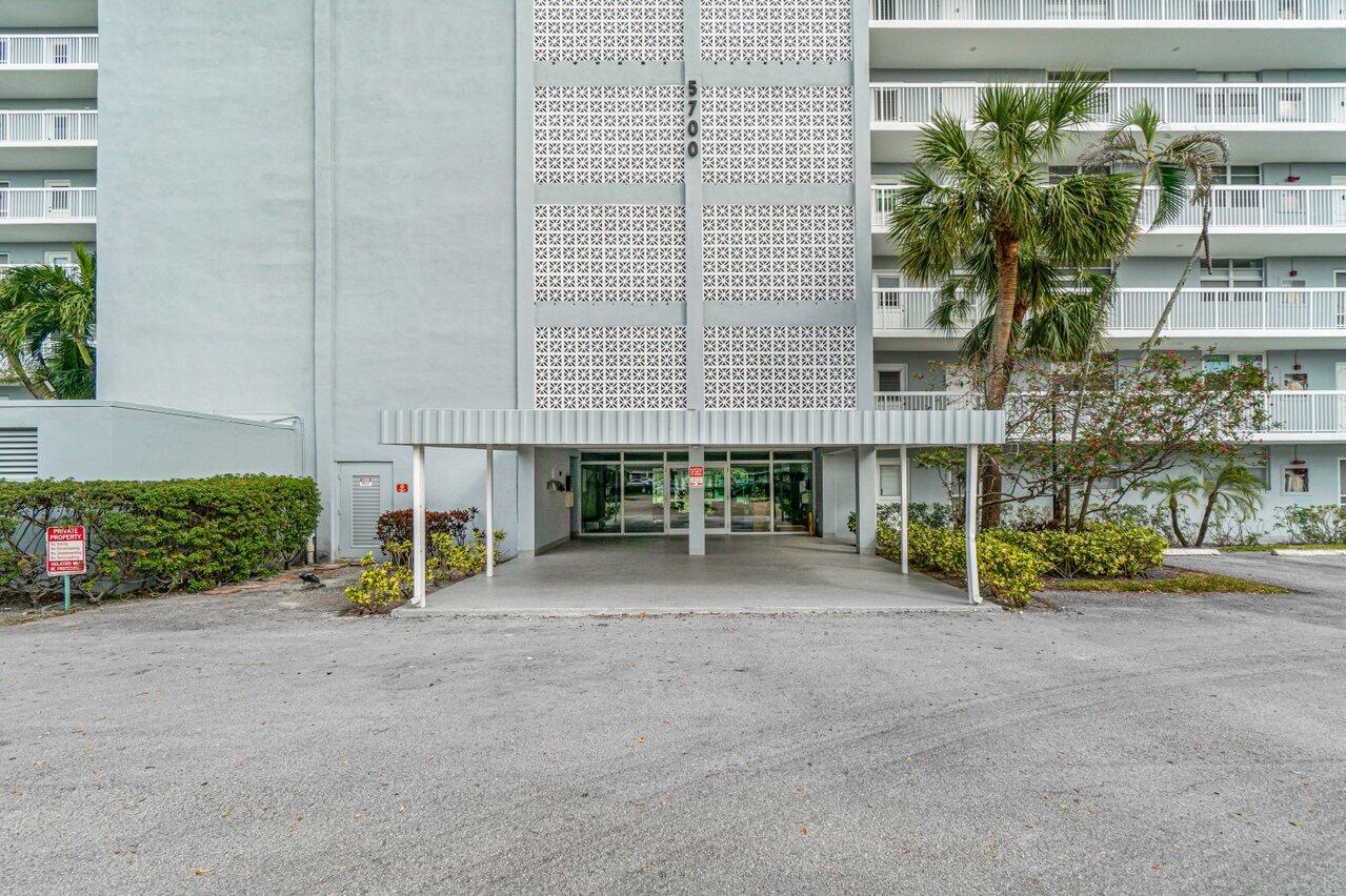 5700 Northwest 2nd Avenue, Unit 401 Boca Raton, FL 33487 - Photo 5 of 30 a front view of a building with garden