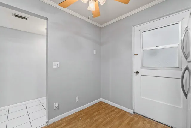 a kitchen with a refrigerator sink and stove