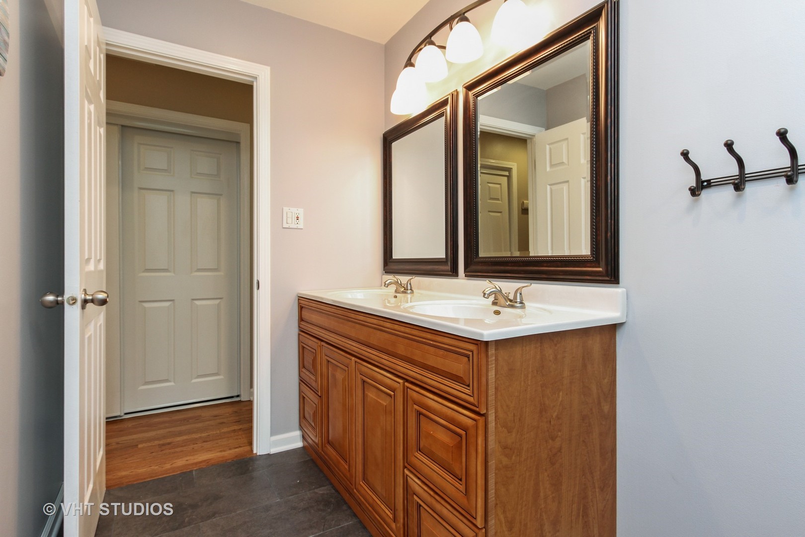 127 Hickory Road Oakwood Hills, IL 60013 - Photo 20 of 28 a bathroom with a sink and a mirror