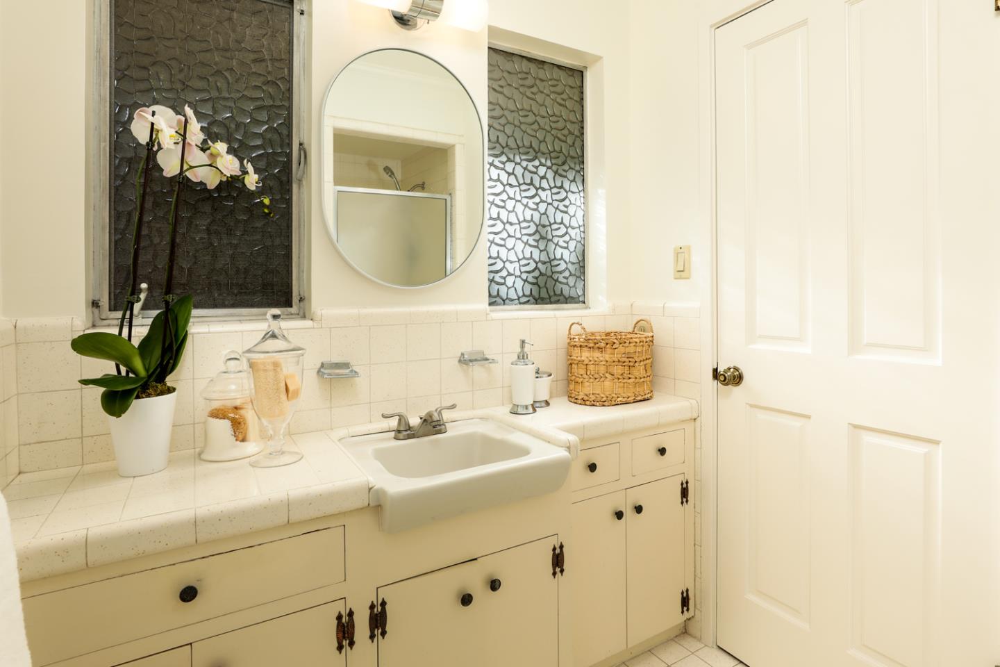 51 Fair Oaks Lane Atherton, CA 94027 - Photo 12 of 22 a bathroom with a sink and a mirror