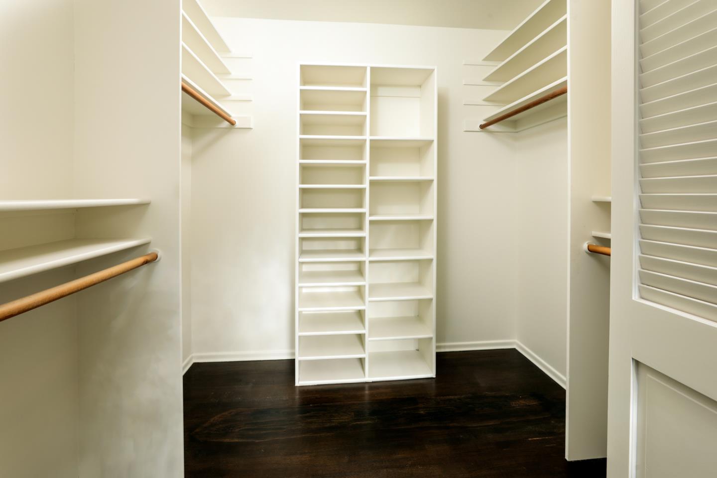 51 Fair Oaks Lane Atherton, CA 94027 - Photo 13 of 22 a view of walk in closet with empty racks