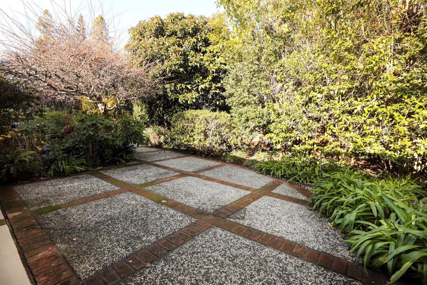 51 Fair Oaks Lane Atherton, CA 94027 - Photo 19 of 22 a view of a yard with plants and trees