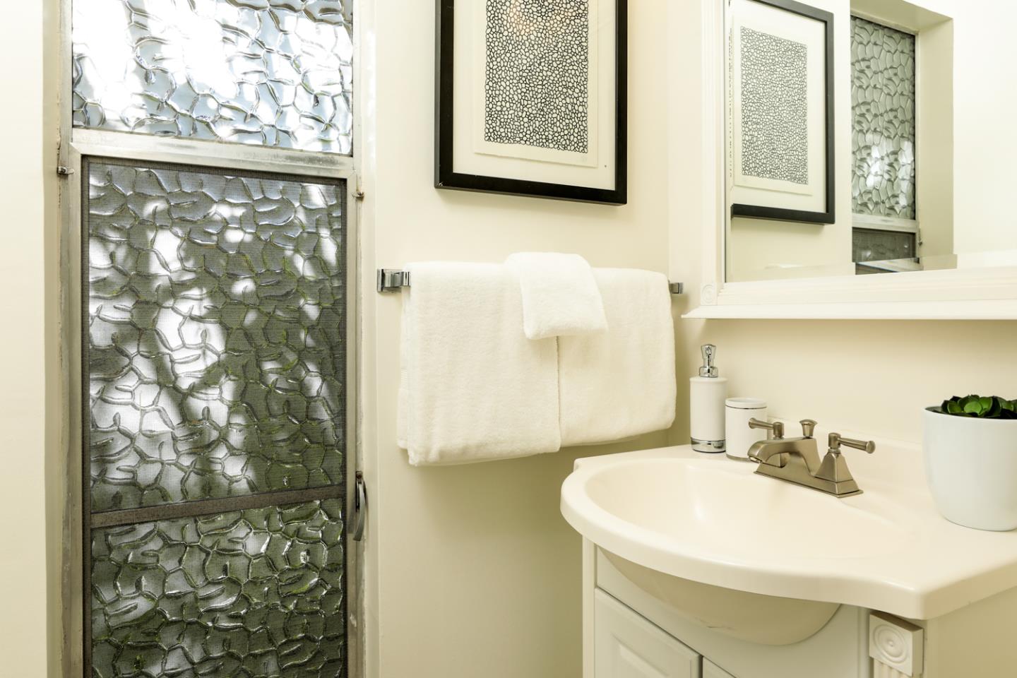 51 Fair Oaks Lane Atherton, CA 94027 - Photo 7 of 22 a bathroom with a sink and a mirror