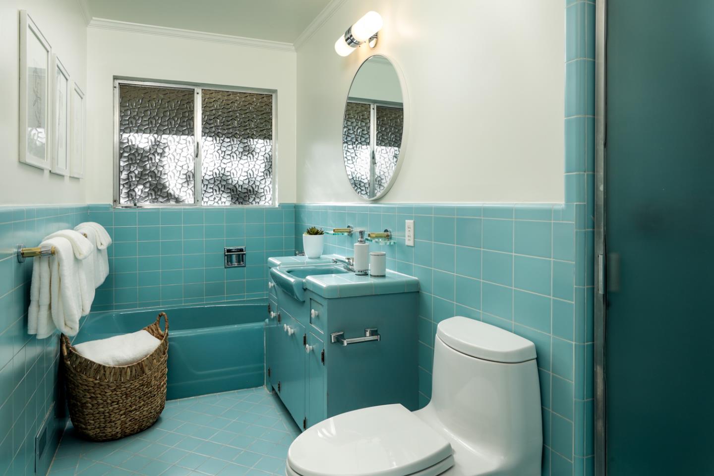 51 Fair Oaks Lane Atherton, CA 94027 - Photo 10 of 22 a bathroom with a toilet sink and mirror