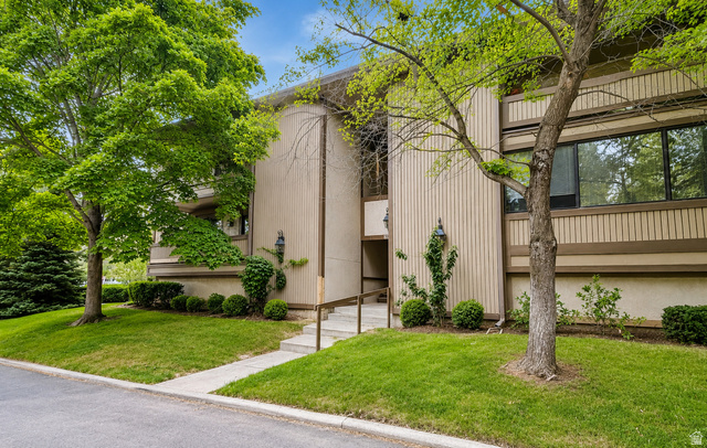 6907 South 745th Street East, Unit G Midvale, UT 84047 - Photo 1 of 30 Surrounded by large shade trees