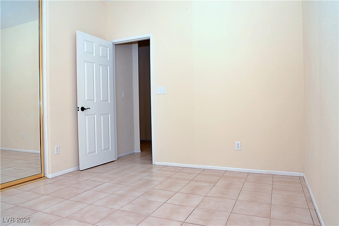 3349 Partridge Run Street Laughlin, NV 89029 - Photo 38 of 58 Empty room featuring light tile patterned flooring