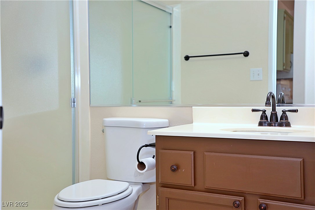 3349 Partridge Run Street Laughlin, NV 89029 - Photo 40 of 58 Bathroom with a shower stall and vanity