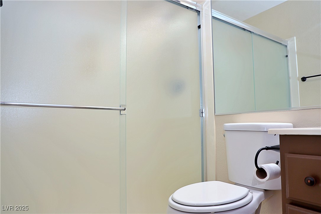 3349 Partridge Run Street Laughlin, NV 89029 - Photo 41 of 58 Bathroom with vanity and a shower stall