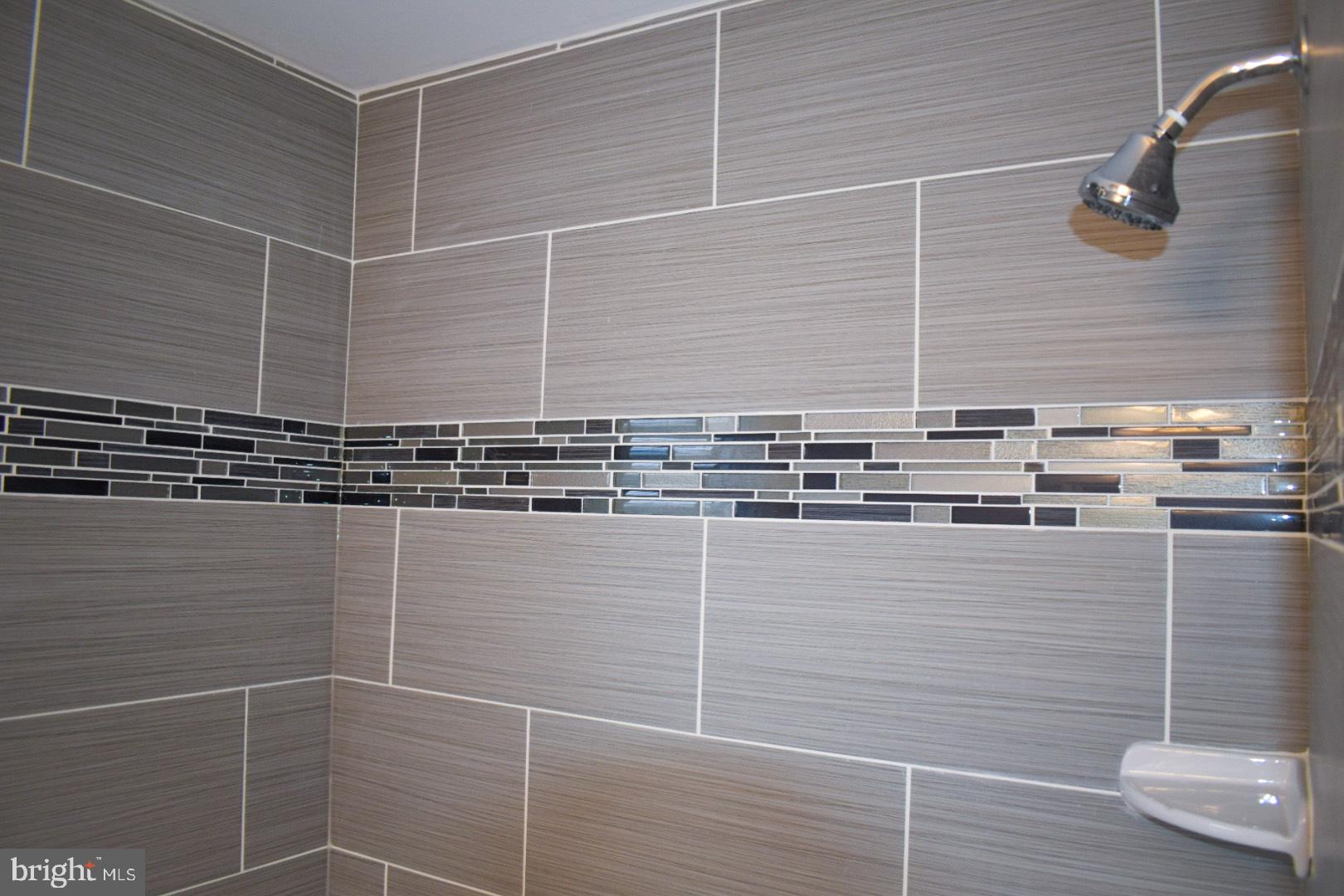 4227 Flowerton Road Baltimore, MD 21229 - Photo 19 of 45 a bathroom with a shower
