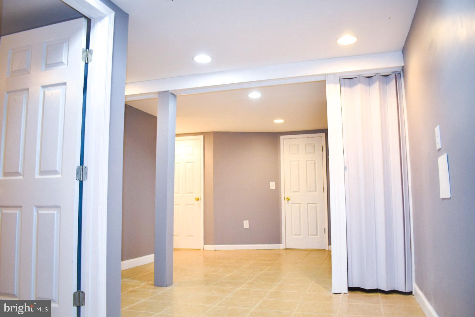 4227 Flowerton Road Baltimore, MD 21229 - Photo 38 of 45 an empty room with closet and a bathroom