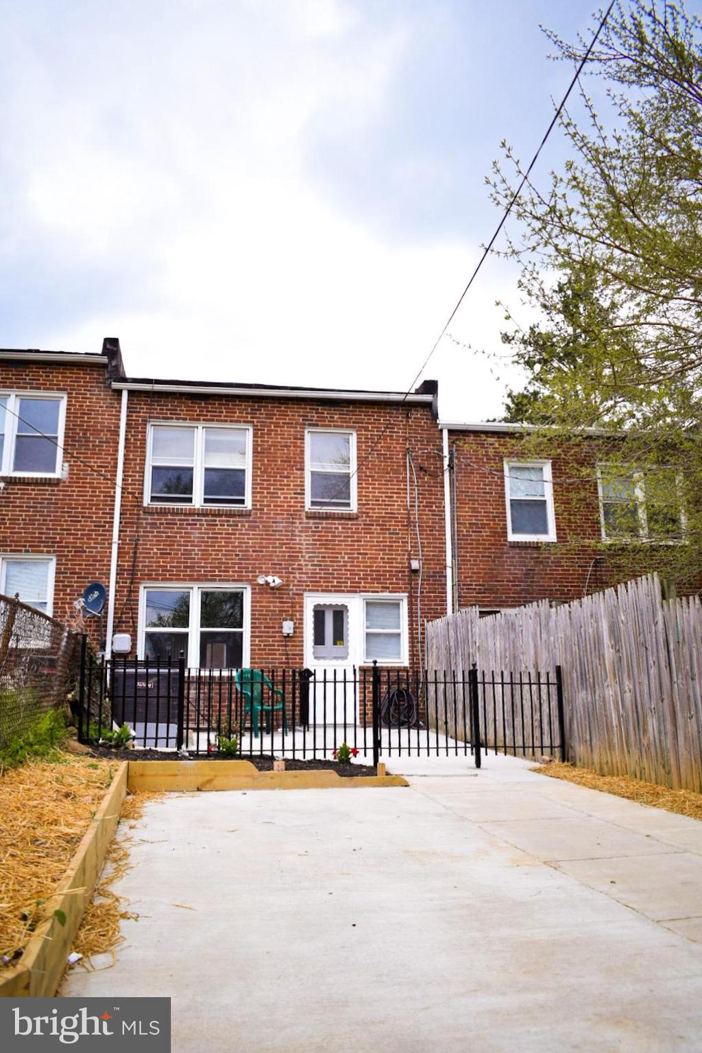 4227 Flowerton Road Baltimore, MD 21229 - Photo 45 of 45 a front view of a house with a yard