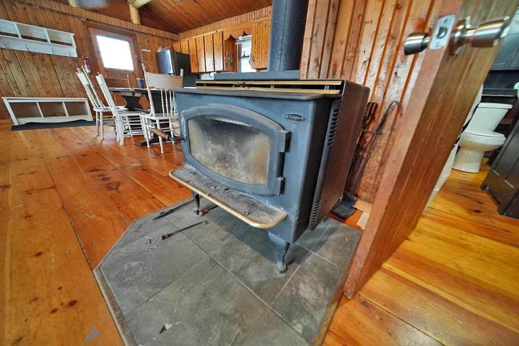 608 Number 9 Road Orient, ME 04471 - Photo 35 of 80 wood-stove-log-me-home
