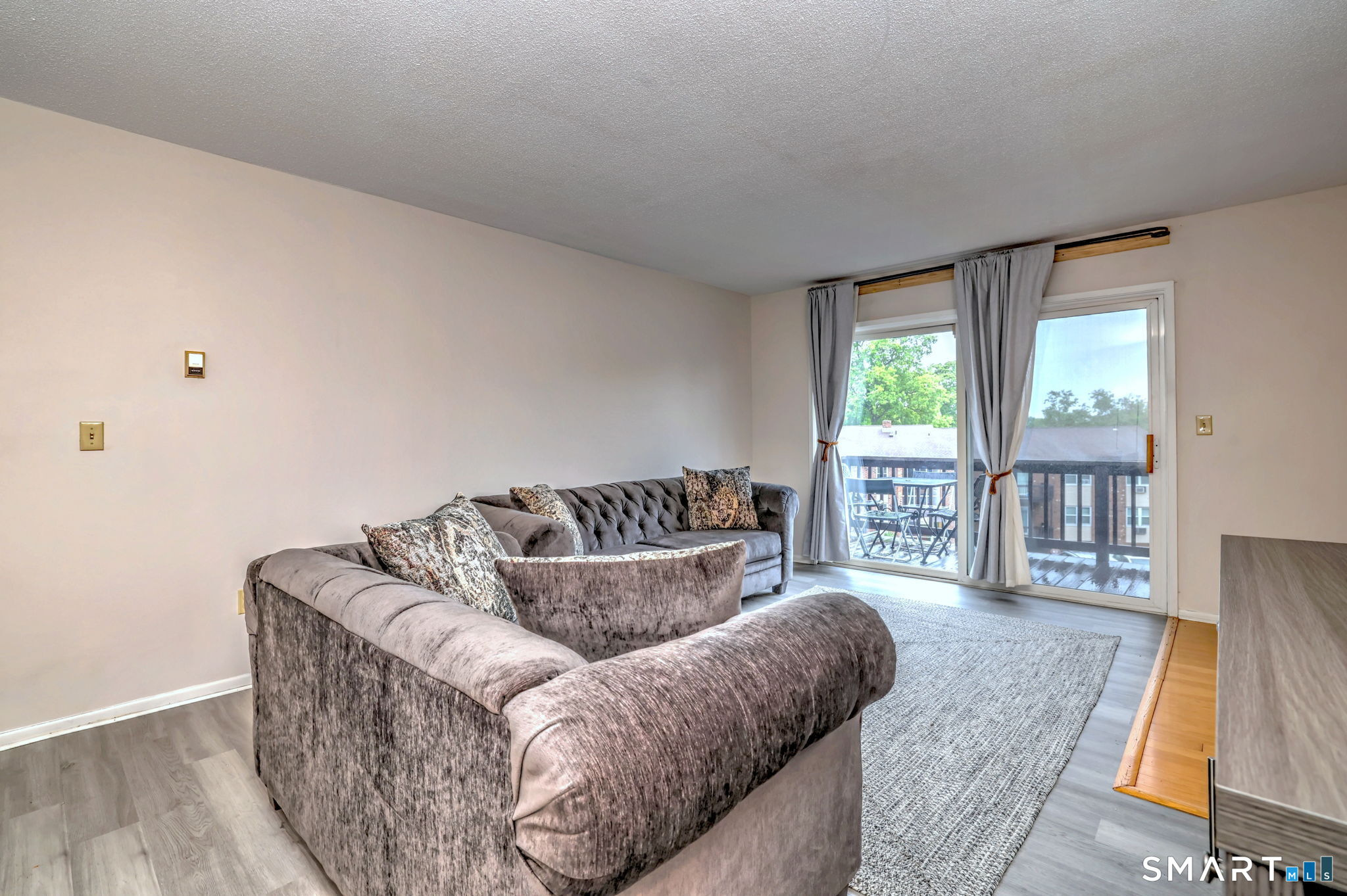 43 Balance Rock Road, Unit 11 Seymour, CT 06483 - Photo 22 of 40 a living room with furniture and a large window